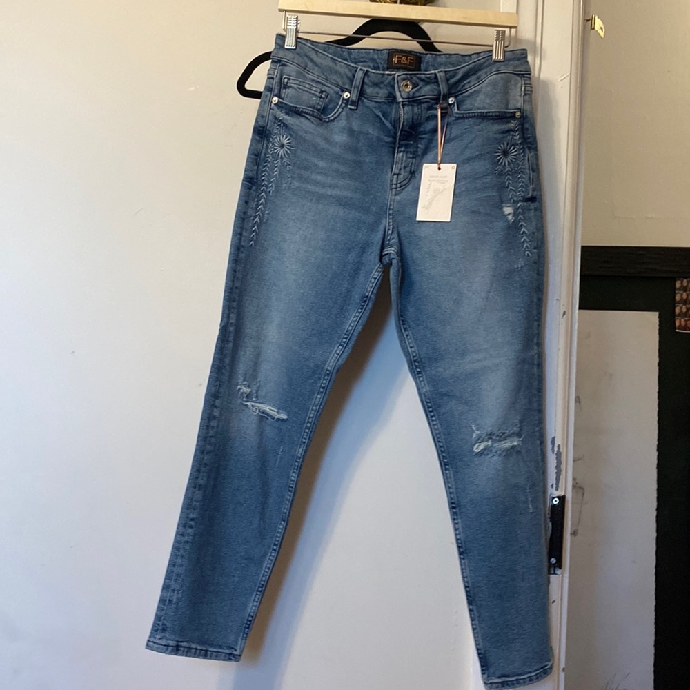 Never worn high waisted boot cut jeans